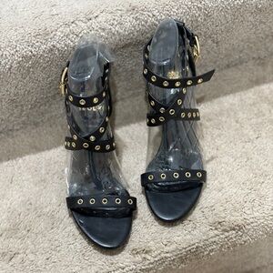 Isola Black Heels with Gold Accents